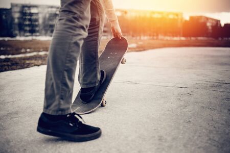 Man is going to skateboarding on the road, people, sport and skateboarding. concept of active recreation. Monochrome and high contrast.の写真素材