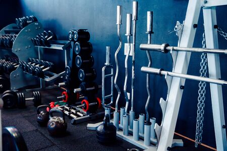 Sports equipment of the gym: barbell, rods, disks, weight, neck, dumbbells.の写真素材