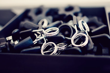 Clamps for sports equipment lie on the stack.