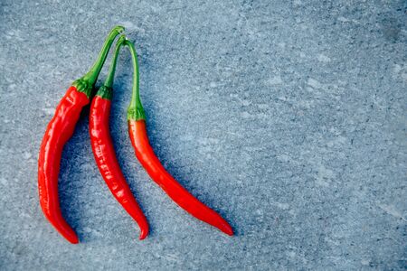 Close-up of chili pepper on a gray background. concept is scalding, spicy, spicy.の写真素材