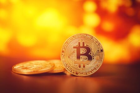 Bitcoins. Bitcoin on Golden background. Concept miningの写真素材