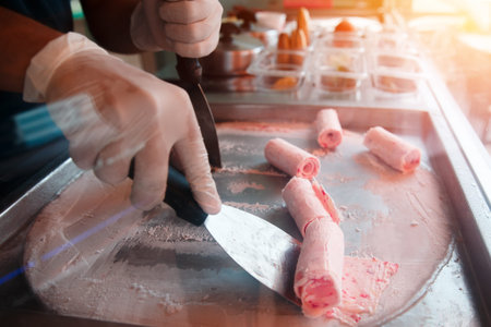 Ice cream roll. Thailand stir-fried ice cream rolls at freeze panの写真素材