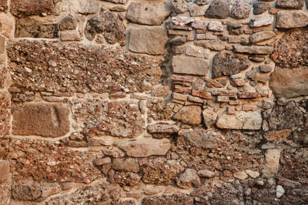 Texture of old bricks, castle wall and ancient ruins. backgroundの写真素材