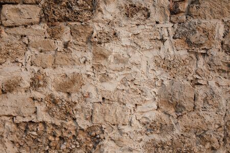 Texture of old bricks, castle wall and ancient ruins. backgroundの写真素材