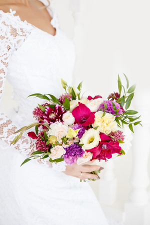wedding bouquet. The bride is holding flowers for the engagement.の写真素材
