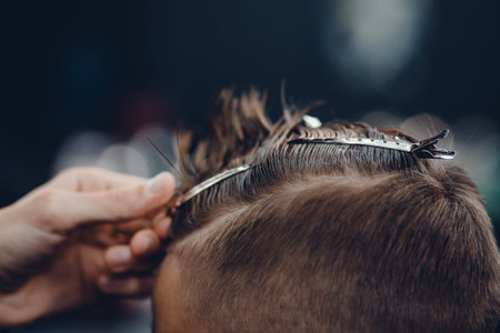Barbershop. Close-up of a man's haircut, hair clips