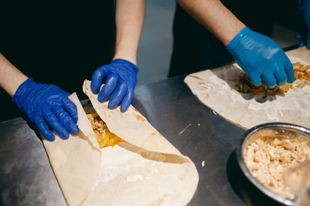 Chef prepares shaurma doner, concept restaurant fast food