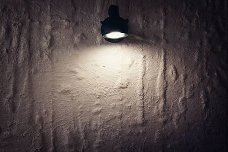 Abstract background. Brick wall, Lantern shines on a place for the text. copyspaceの写真素材