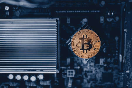 Bitcoin. Gold Bitcoin electronic computer processor boardの写真素材