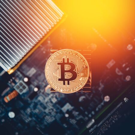 Bitcoin. Gold Bitcoin electronic computer processor boardの写真素材