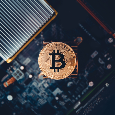 Bitcoin. Gold Bitcoin electronic computer processor boardの写真素材