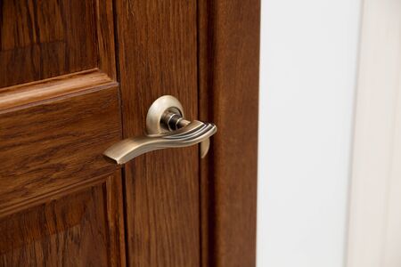 Closeup handle. Modern door handle, tilt view. の写真素材