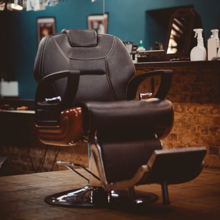 Barbershop armchair. modern hairdresser and hair salon, barber shop for men.の写真素材