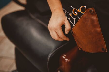 Barber shop. Close-up of barber tools for cutting hair in a male hairdresser. Baner copyspaceの写真素材