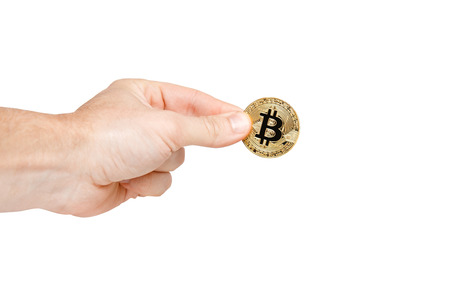 Bitcoin. Bitcoin with hand on isolated backgroundの写真素材
