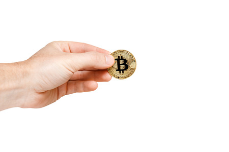 Bitcoin. Bitcoin with hand on isolated backgroundの写真素材