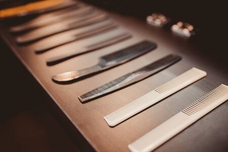 hairdresser's tools: combs, razors, scissors, clip-on hair clipperの写真素材