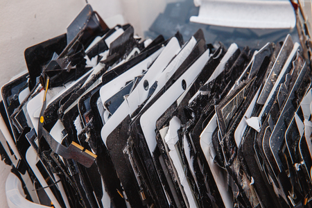 TOMSK, RUSSIA - November 29, 2017: Used batteries of mobile phones iPhone, preparation for recycling and disposal in the serviceのeditorial素材