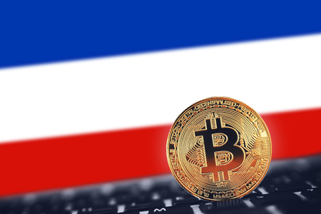 Bitcoin Blockchain. Bitcoin on Netherlands flag backgroundの写真素材
