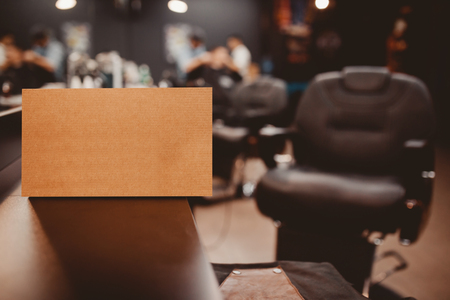Barbershop. Box with gifts, in background barber chair. Place for your text. copyspaceの写真素材