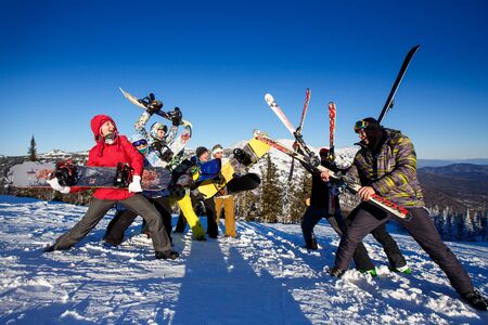 Sheregesh, Kemerovo region, Russia - January 4, 2018: Group of merry people with skis and snowboards playのeditorial素材