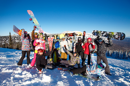 Sheregesh, Kemerovo region, Russia - January 4, 2018: Group of merry people with skis and snowboards playのeditorial素材
