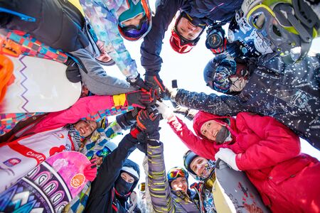 Sheregesh, Kemerovo region, Russia - January 4, 2018: Group of merry people with skis and snowboards playのeditorial素材
