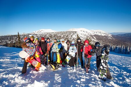 Sheregesh, Kemerovo region, Russia - January 4, 2018: Group of merry people with skis and snowboards playのeditorial素材