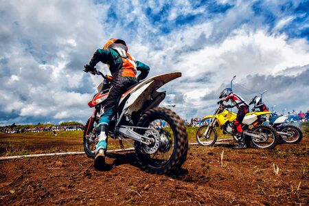 Dirtbike. Athlete bikers is start motocross. Concept active rest moto extreme dirt bike.の写真素材