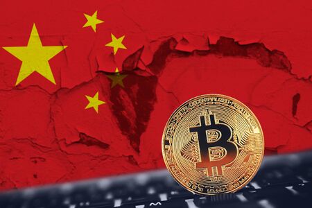 Gold Bitcoin on background of flag China. Concept prohibition of bitcoin, mining, crypto currency in Chinese People's Republicの写真素材
