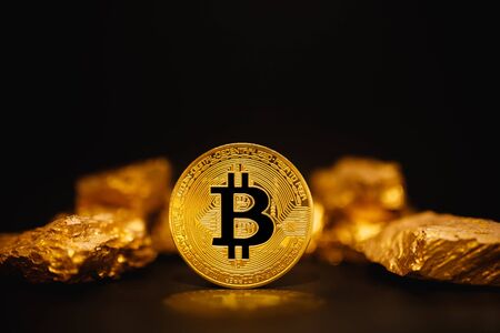 Bitcoin. Bitcoin on Golden background. Nugget goldの写真素材