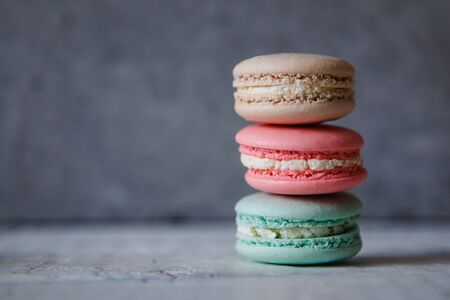 Macaroon. Macaron on gray neutral loft background, different colorsの写真素材