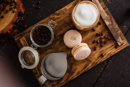 Coffee. Top view, breakfast. Coffee latte with croissants lie on a wooden tray.の写真素材