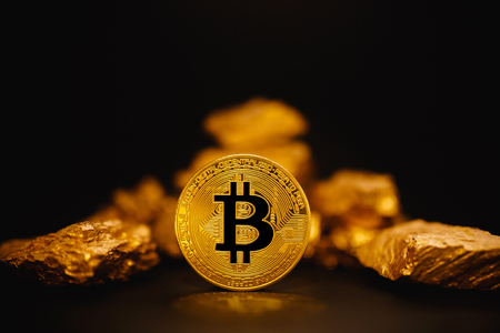 Bitcoin. Bitcoin on Golden nugget gold background. Concept Bitcoin cryptocurrency, Businessの写真素材