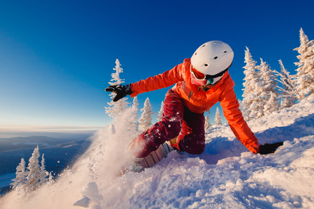 Action snapshot of snowboarder in motion. Freeride snowboarding in Sheregesh Ski Resortの写真素材