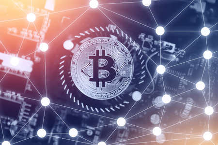 Bitcoin hardfork. Gold Bitcoin electronic computer processor board hard forkの写真素材