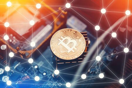 Bitcoin hardfork. Gold Bitcoin electronic computer processor board hard forkの写真素材