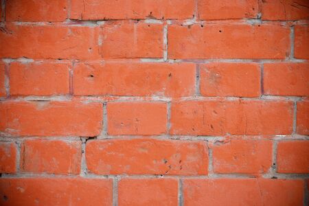 Brick texture. Red middle block. Space for text, large spaceの写真素材
