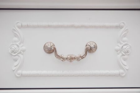Vintage handle from chest of white color. Retro styleの写真素材