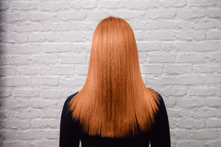 Sick, cut and healthy hair. red Hair after treatment.の写真素材