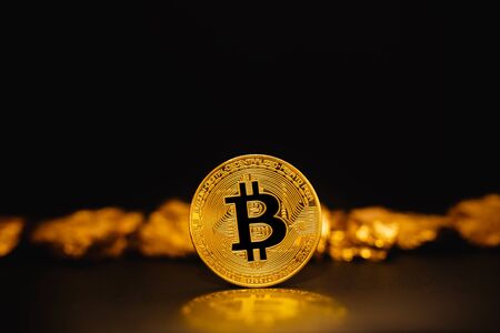 Bitcoin. Bitcoin on Golden nugget gold background. Concept Bitcoin cryptocurrency, Businessの写真素材