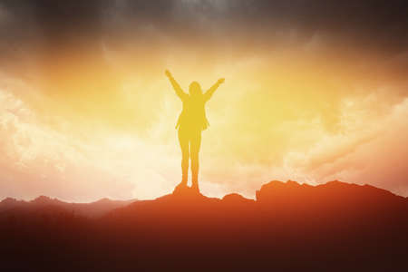 Girl traveler with backpack hiking. Concept travel, lifestyle adventure active summer vacations outdoor rocky background mountainsの写真素材