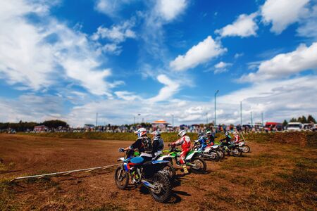 Dirtbike. Team Motocross on bike motorcycle is start road.の写真素材