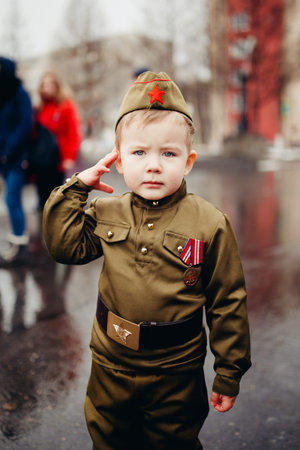 Murmansk, RUSSIA - MAY 9, 2017: Immortal regiment procession in Victory Day. Child in military...