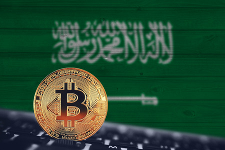 Bitcoin. Bitcoin on the background of flag Saudi Arabia.の写真素材