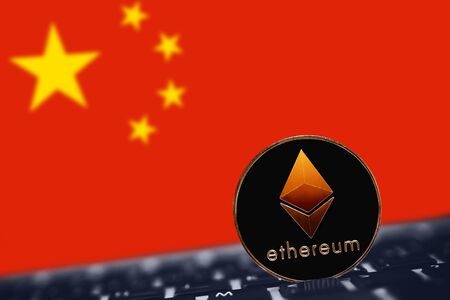 Ethereum. Ethereum on the background of flag China.の写真素材