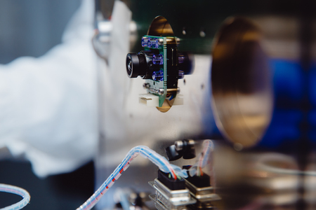 Science camera. Speed camera captures the microscope readings in the box.の写真素材