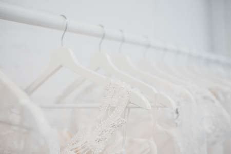 White modern wedding dresses in dress store.の写真素材