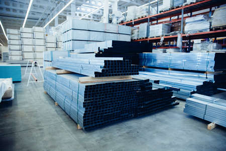 Steel, Shelf with structural materials on the shelves in the building warehouse.の写真素材