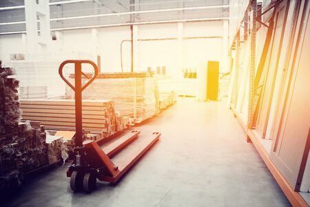Building materials warehouse, logistics concept, construction of houses, loader. high contrast and monochrome color tone. の写真素材
